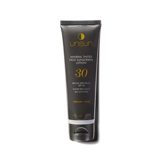 UnSun Cosmetics Mineral Tinted Sunscreen SPF 30 in MediumDark black tube on white background